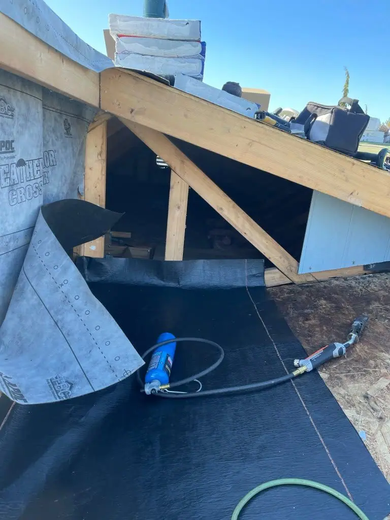Underlayment run up against new wall framing