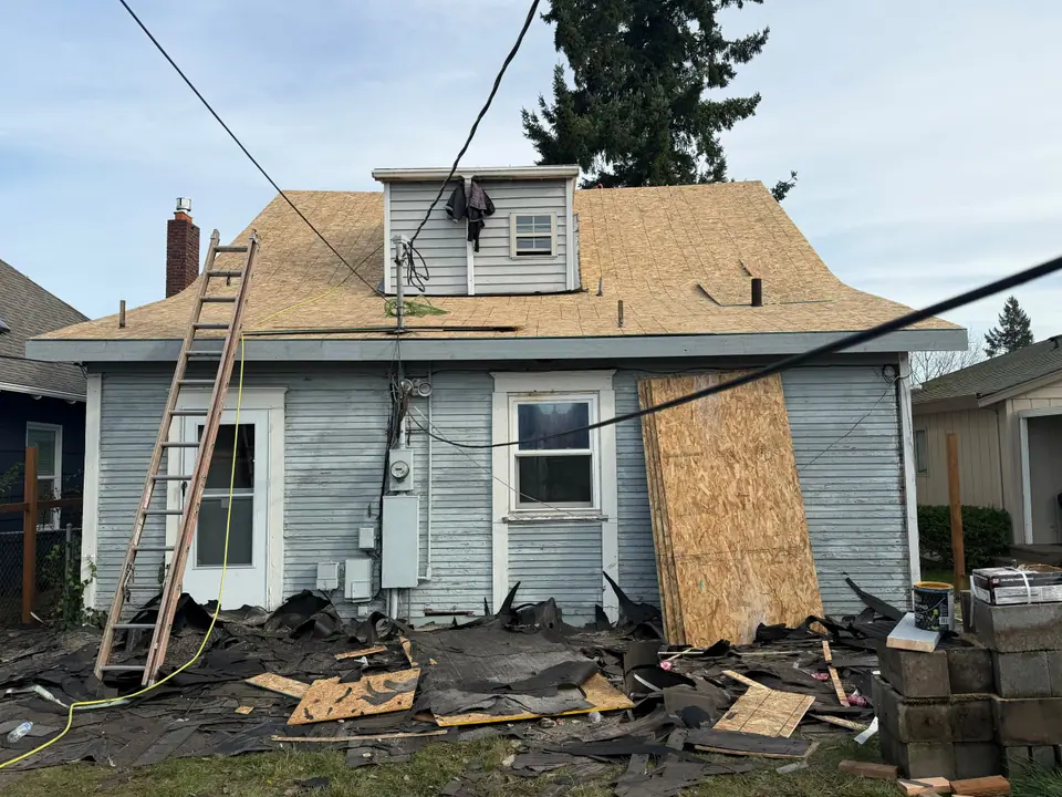 Before: tear-off day, old roof removed