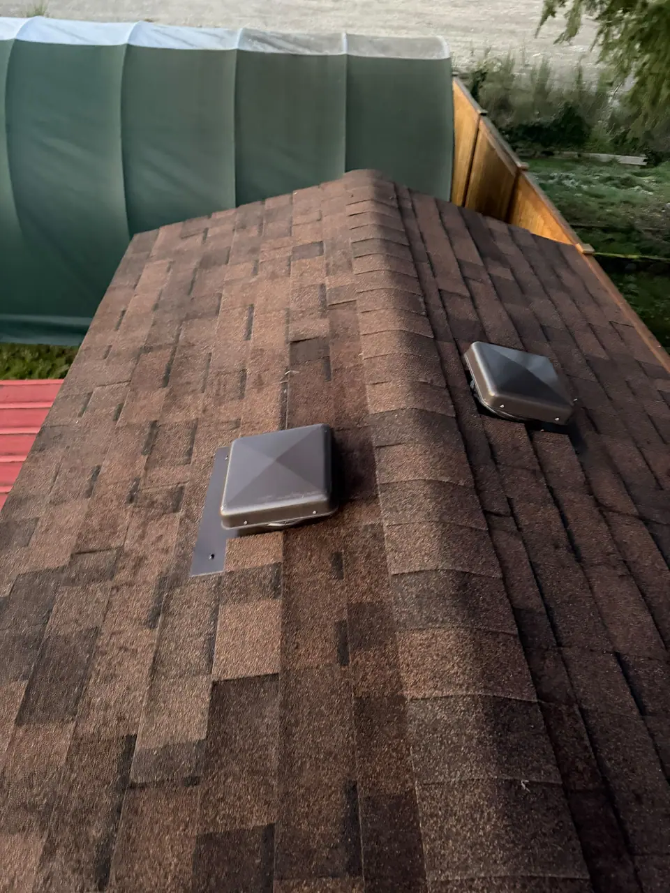 Brown shingles with new box vents