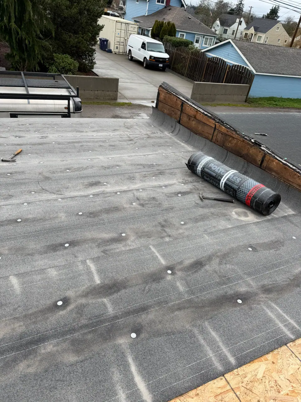 New roll roofing going down