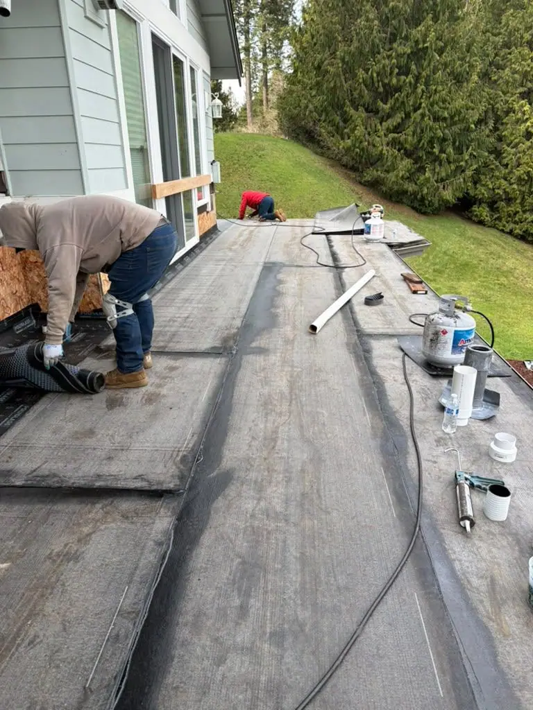 Crew sealing the laps