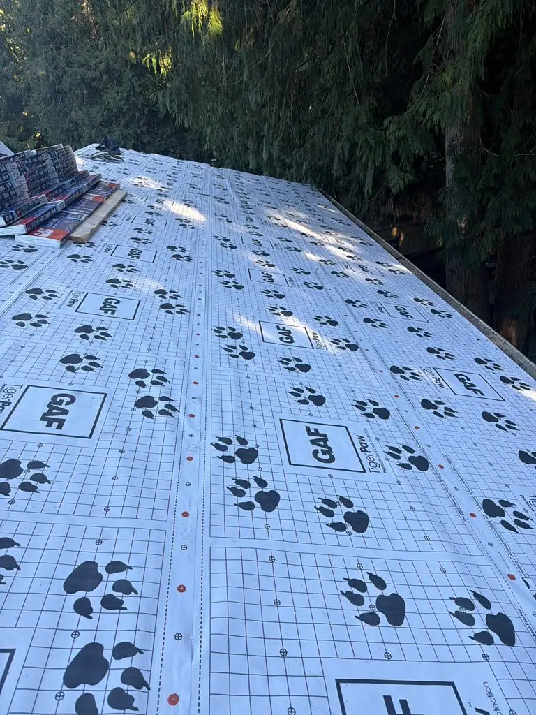 Synthetic underlayment over the whole deck