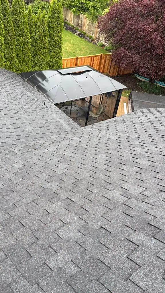 Shingles next to a sunroom
