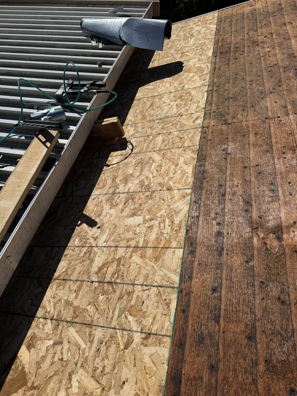New sheathing over old boards
