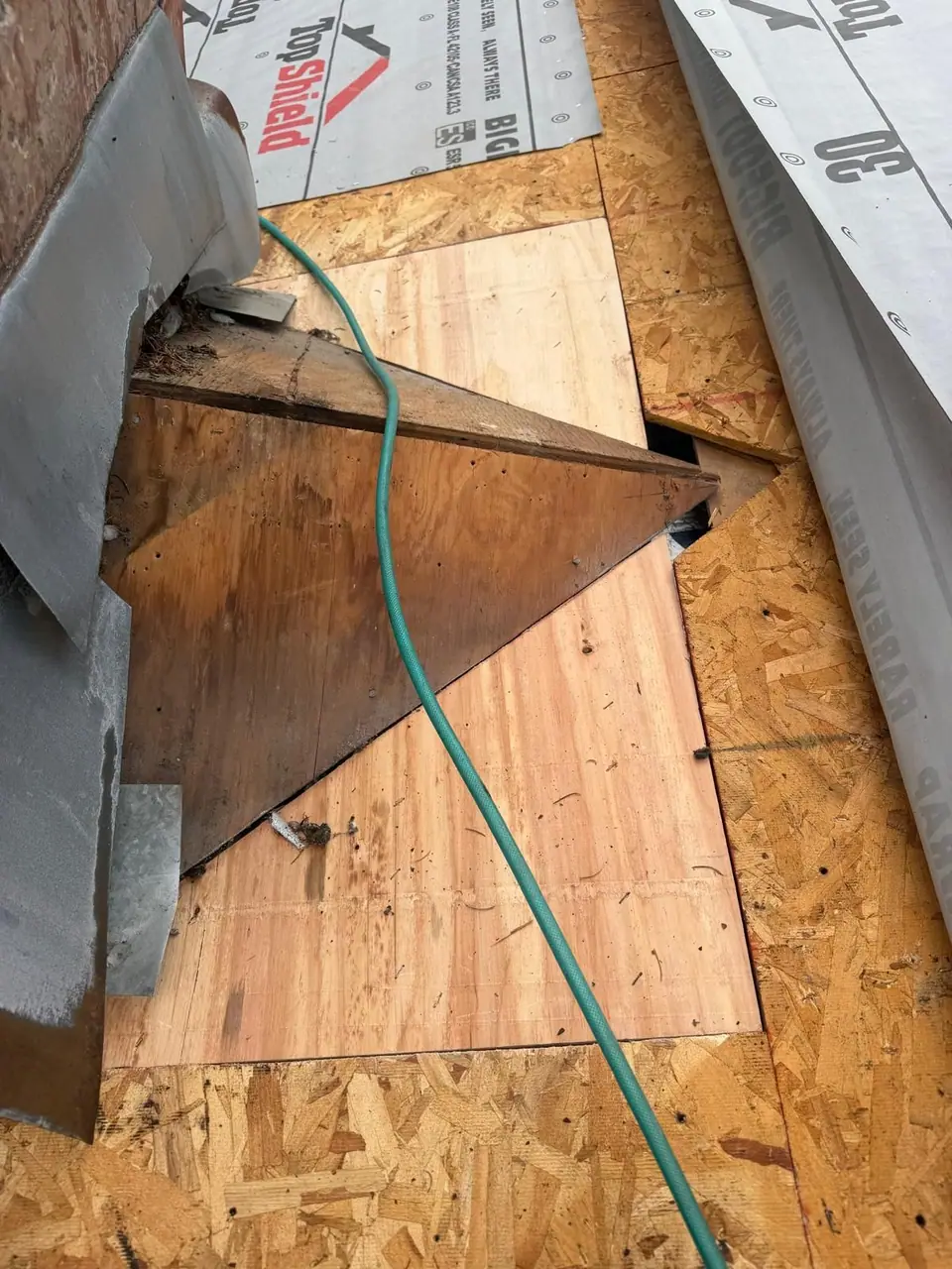 New plywood patched into a valley
