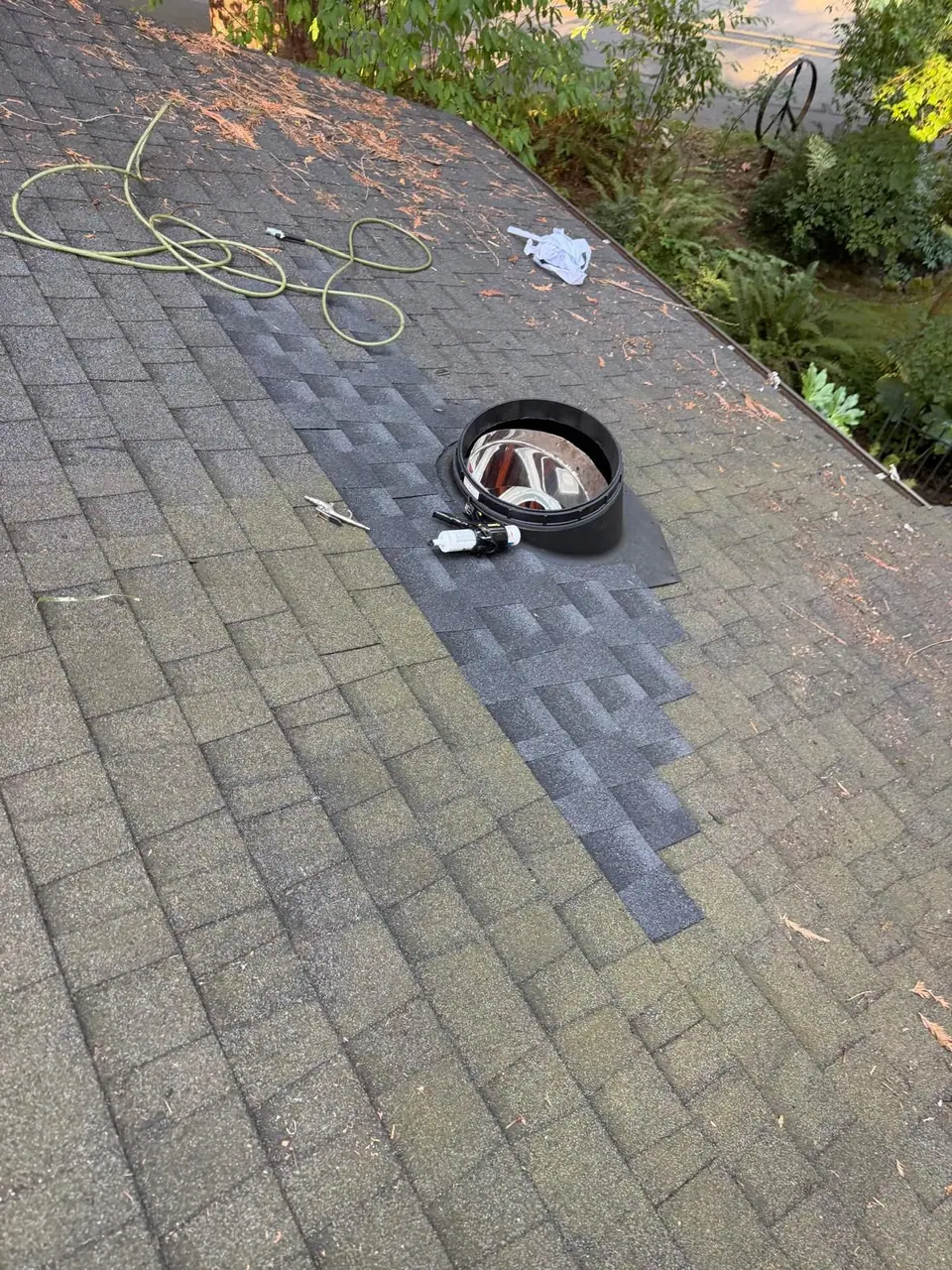 New tube skylight flashing on the shingles