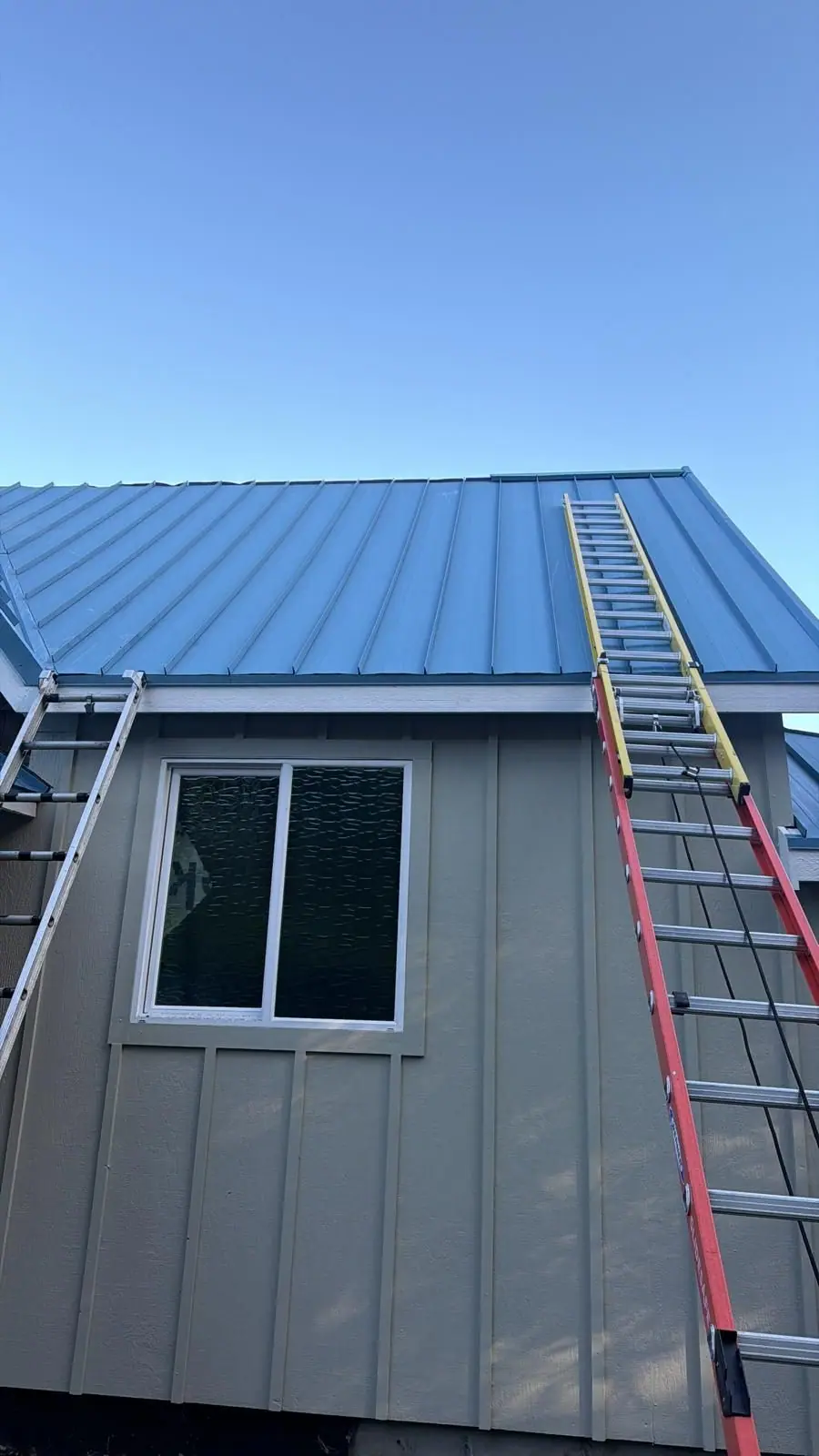 Metal roof seen from the ladder
