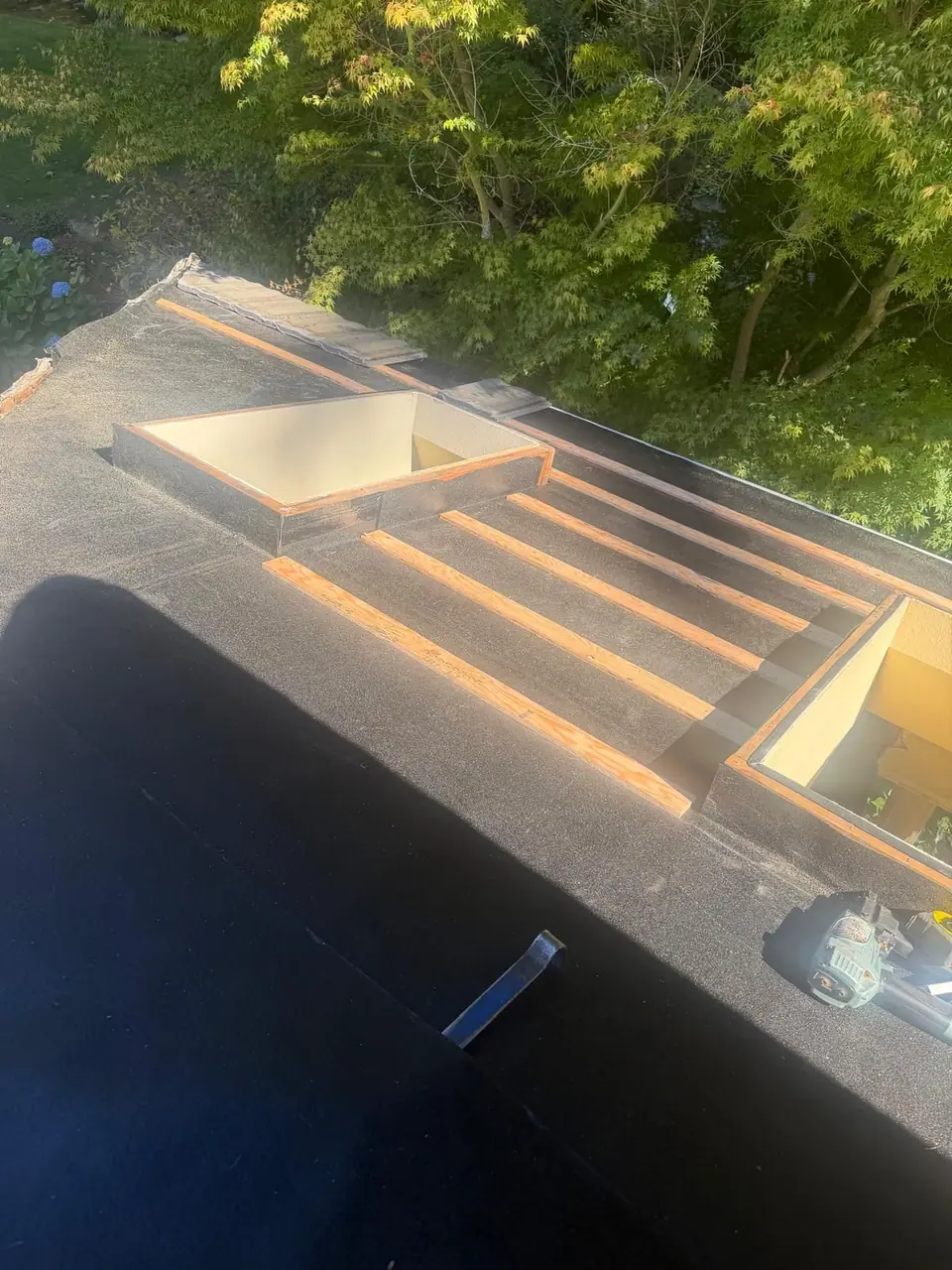 Skylight curbs on a low-slope roof